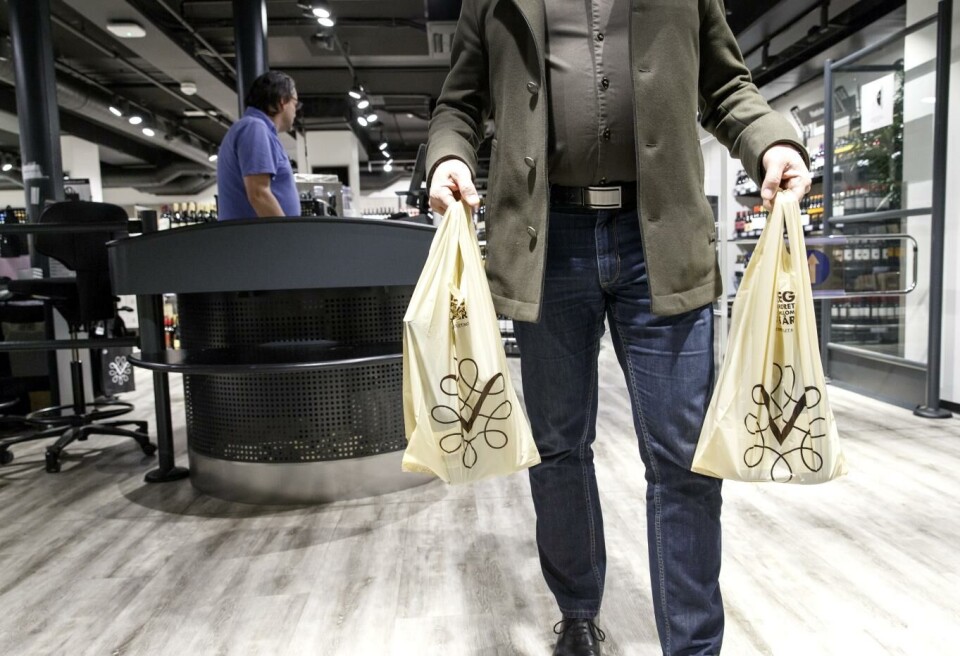 Vinmonopolet ber kundene om å planlegge årets julehandel. Foto: Gorm Kallestad, NTB